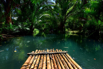 Adventure ride on Bamboo rafting at emerald lagoon through out the deep forest.