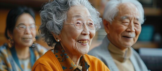 Fototapeta premium old senior asian friends retired people hapiness positive laugh smile conversation together at living room at nursing home Seniors participating in Group Activities in Adult Daycare Center