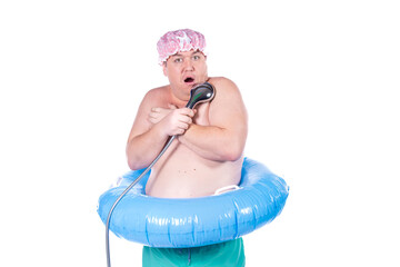 Funny fat man in the shower. White background.