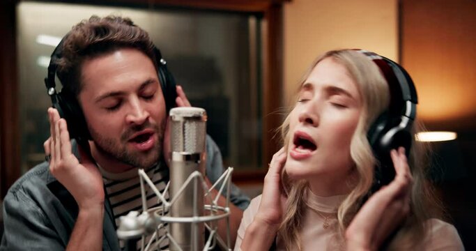 People, musician and singing in music studio for song recording at booth with microphone for voice control. Group, duo and artist or friends with headphone as singer for collaboration and performance