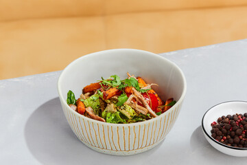 Fresh Salad with Sweet Potato Fries and Pulled Beef in Modern White Bowl