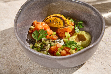 Authentic Salmon Tartare with Avocado in Sunlit Still Life