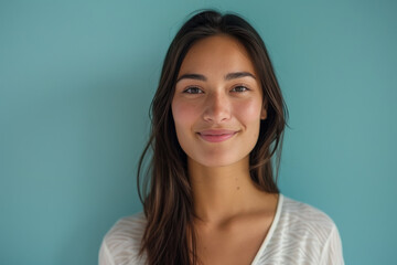 Fototapeta premium A close up portrait of a young woman with a subtle smile