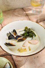 Creamy Seafood Soup in Sunlit Still Life Setting with Natural Aesthetic