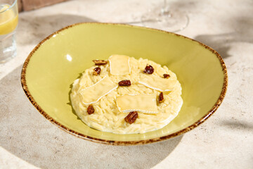Risotto with Brie Cheese and Pecan Nuts in Sunlit Still Life Aesthetic