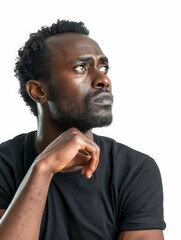 Black Man With Short Hair Looking Upward in Thought