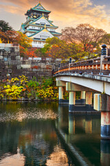 Fototapeta premium Osaka, Japan at Osaka Castle's Main Keep During an Autumn