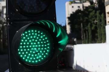 A lamp for illuminating the interior of the room hangs on the ceiling.