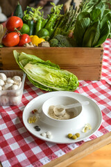 Fresh vegetables full of vitamins, minerals and fiber versus synthetic dietary supplements in the form of tablets or powder, health and nutrition concept, selected focus