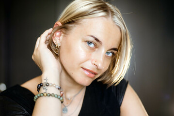 Fototapeta premium beautiful girl with blond hair posing for the camera