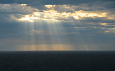 sun rays breaking through the clouds