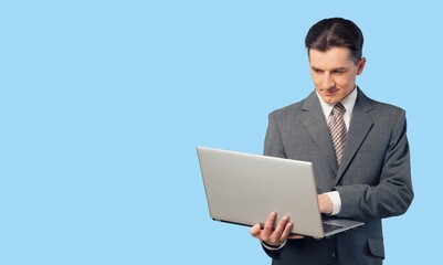 Photo of cheerful man hold laptop computer