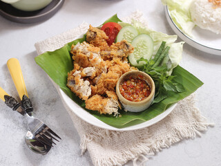 Ayam Geprek Indonesian Food crispy fried chicken with hot and spicy sambal Chili Sauce. Currently ayam geprek found in Indonesia and neighbouring countries, Origin Yogyakarta