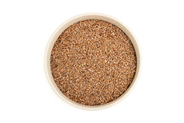 Bowl of flaxseeds on a white background