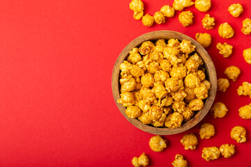 Tasty popcorn in color background. Cinema and entertainment concept. Movie night with popcorn.Cheese and caramel popcorn. Delicious appetizer, snack. Place for text. Copy space.Banner