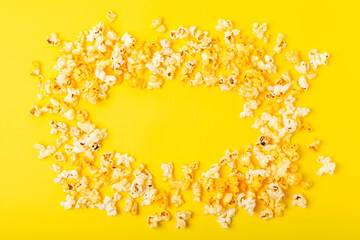 Tasty popcorn in color background. Cinema and entertainment concept. Movie night with...