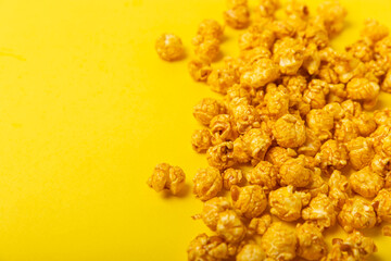 Tasty popcorn in color background. Cinema and entertainment concept. Movie night with popcorn.Cheese and caramel popcorn. Delicious appetizer, snack. Place for text. Copy space.Banner