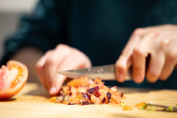 making homemade guacamole with different vegetables. culinary arts