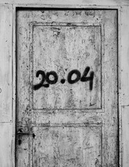 Save the Date. Mysterious Closed Door Frame with Numbers 20.04 . Remember the Time.