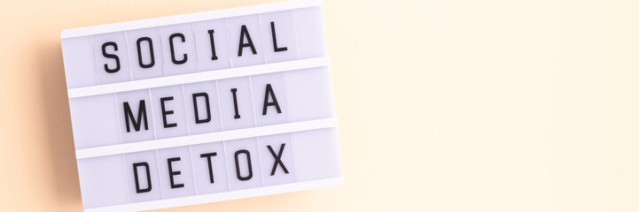 Social media detox. Banner with lightbox on a beige background. Place for text.