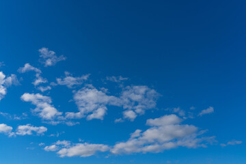 Obraz premium white fluffy clouds isolated on a black background