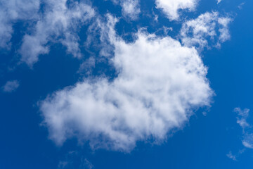Obraz premium white fluffy clouds isolated on a black background