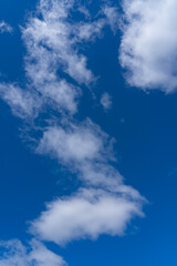 white fluffy clouds isolated on a black background