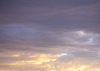 Naklejka premium Sky with clouds sunset sunrise blue golden tint