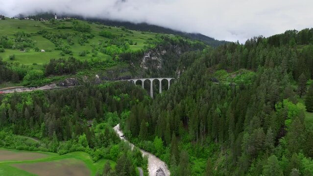 Landwasser viaduct in Switzerland mountain from drone