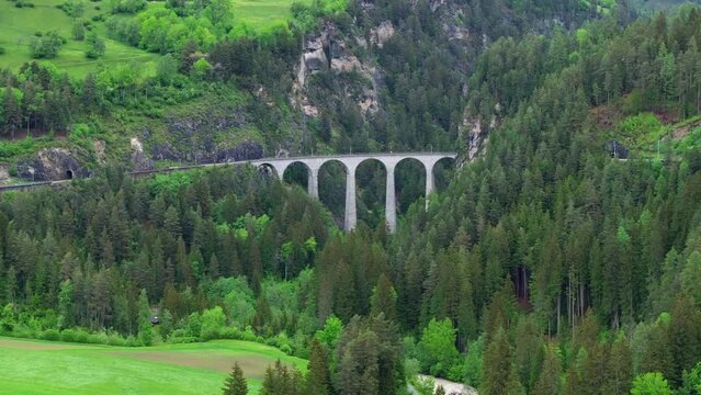 Landwasser viaduct in Switzerland mountain from drone