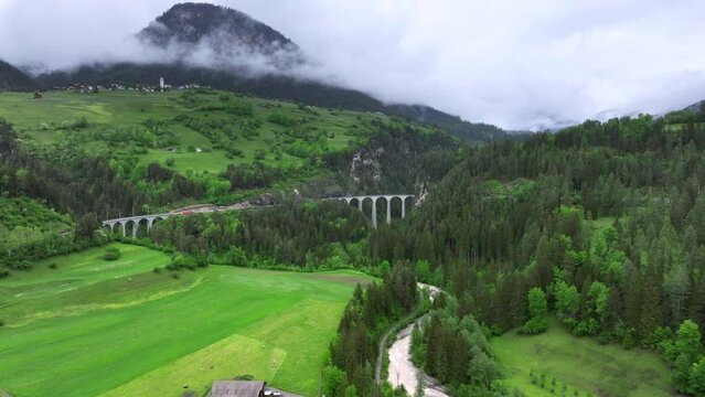 Landwasser viaduct in Switzerland mountain from drone
