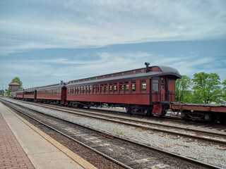 Fototapeta premium Old model train at train station in Stroutsurg, PA