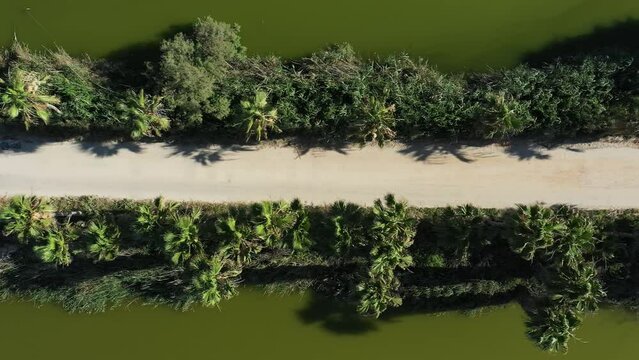 Aerial video over fish ponds and coastline in Jisr az Zarqa Israel
