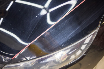 Person using machine to polish cars automotive exterior