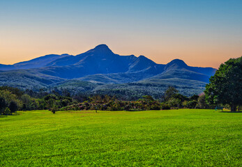 Obraz premium Outeniqua Mountains during sunset from botanical garden, George, Garden route, South Africa