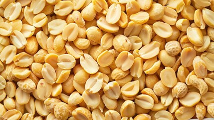 Background of peeled peanuts that are roasted and stacked