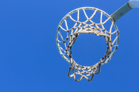 netball hoop against blue sky