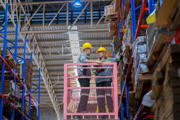 workers man and woman using a hydraulic scissor lift to check stock near the shelves warehouse. industry factory warehouse. Worker Screening Package In Warehouse.