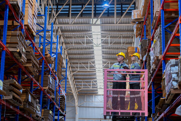 workers man and woman using a hydraulic scissor lift to check stock near the shelves warehouse. industry factory warehouse. Worker Screening Package In Warehouse.