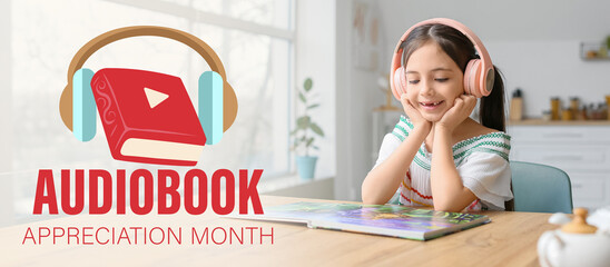 Little girl with headphones reading book at home