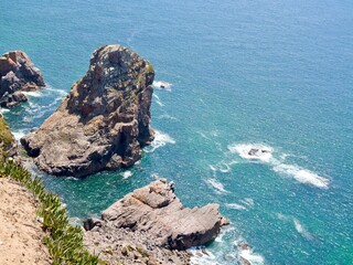 View of the coast from Cape Roca (Cabo da Roca), the westernmost point of the Sintra Mountain Range, of mainland Portugal, of continental Europe and of the Eurasian landmass