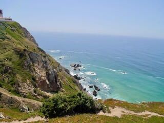 View of the coast from Cape Roca (Cabo da Roca), the westernmost point of the Sintra Mountain Range, of mainland Portugal, of continental Europe and of the Eurasian landmass