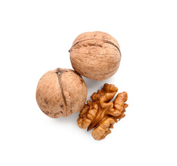 Tasty walnuts on white background