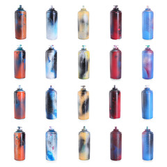 Different used spray paint cans isolated on white, set