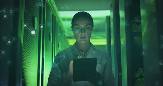Image of molecular structures over caucasian female engineer using digital tablet at server room