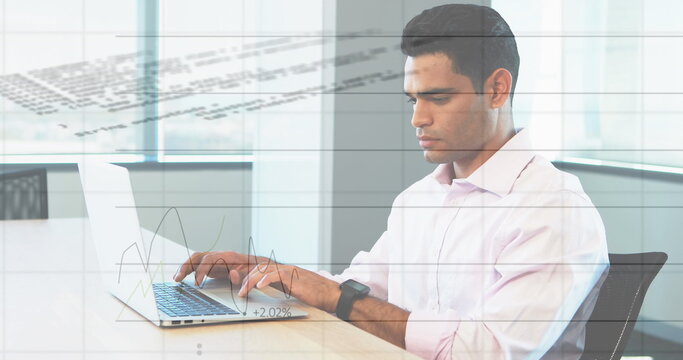 Image of financial data processing over biracial businessman using laptop at office