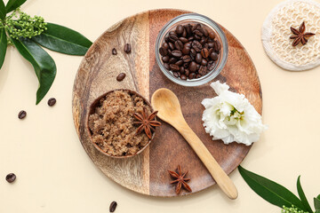Composition with natural body scrub, coffee beans and plant branches on color background