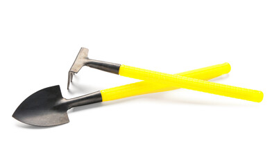 Shovel and rake on white background. gardening tools