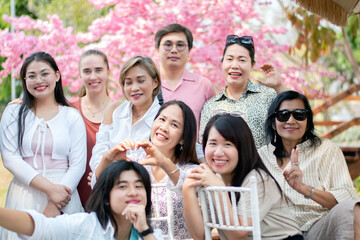 Group of company people spending freetime at weekend  together by traveling and having food and drinks happily.