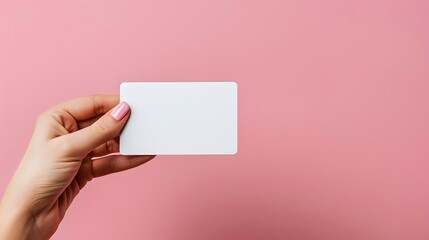 Hand holding an empty white card on a pink background, representing the concept of AI-generated humorous ID cards for business or personal use.